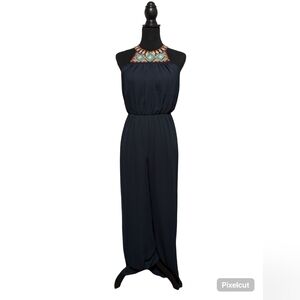Elegant Black Jumpsuit with Embellished Neckline